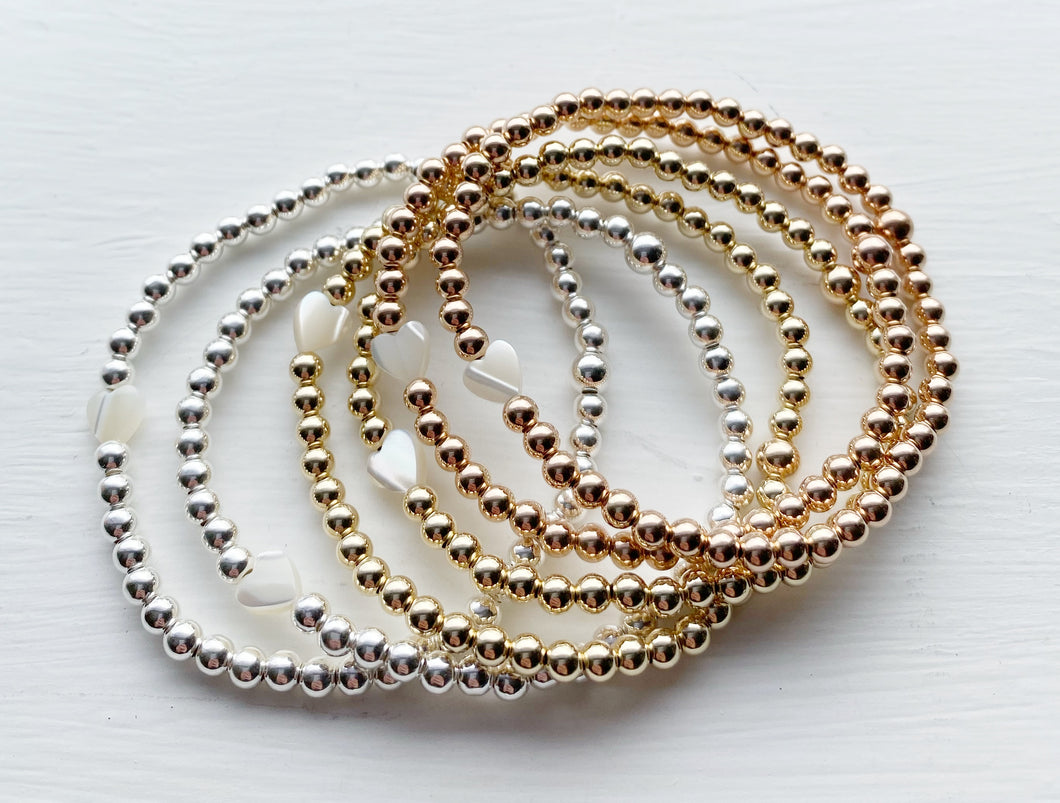Precious Metal Beaded Bracelets with Mother of Pearl Heart